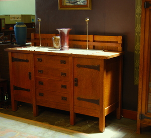 Gustav Stickley vintage eight leg sideboard with hand hammered copper hardware.  Double signed.